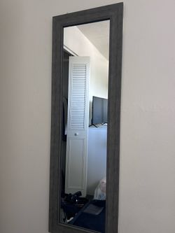 Grey wood framed full length mirror