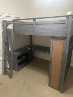 Elevated Full Bed with Desk, Shelves, and Cork Board