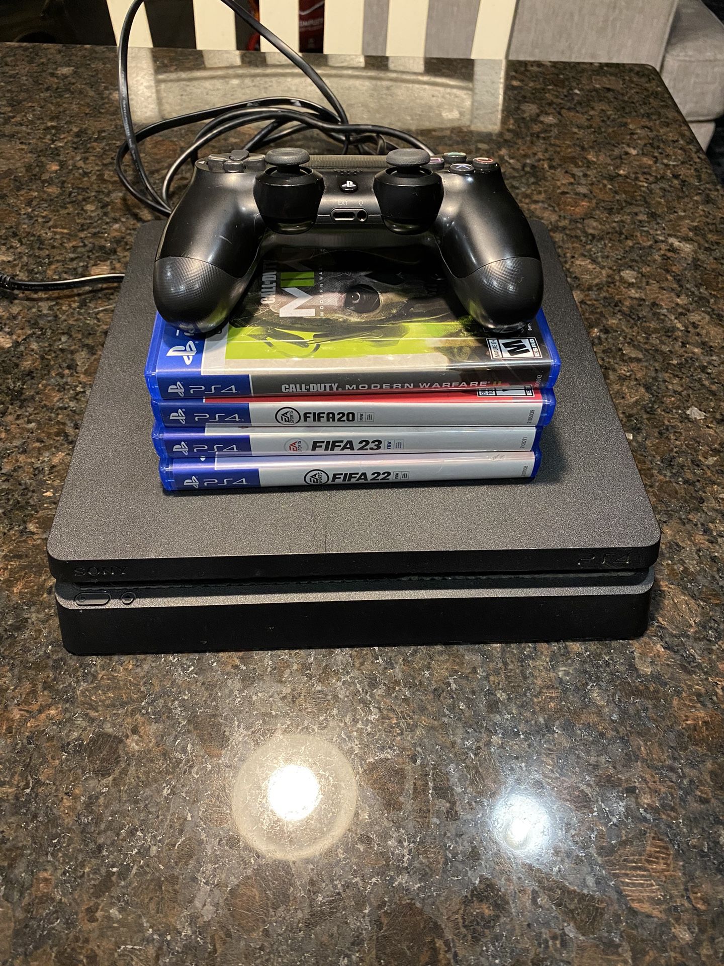 PS4 With Controller And Games