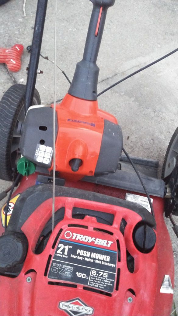 Used l Troy-Bilt mower with weed eater