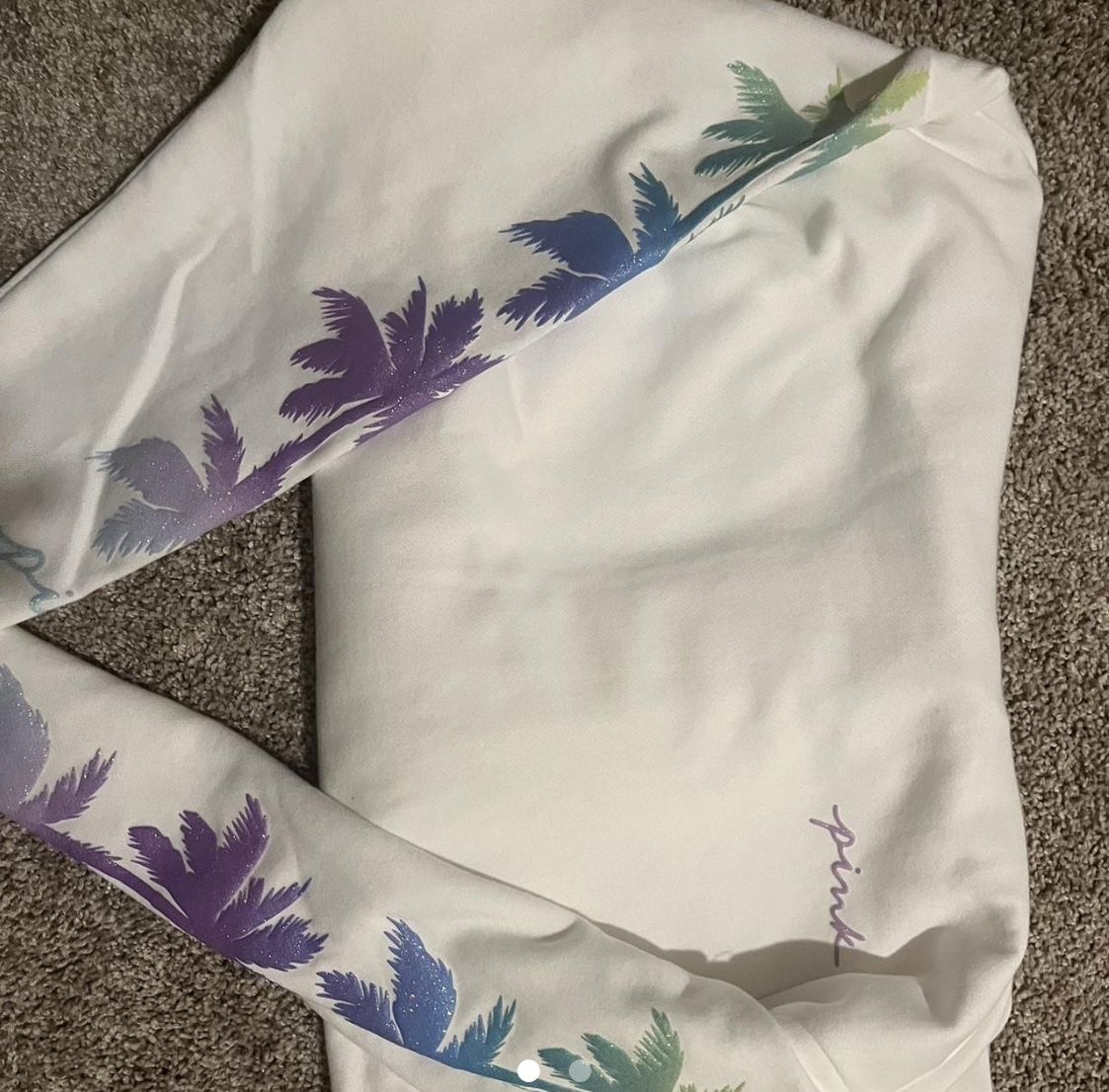 2 pink hoodies