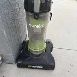 Eureka AirSpeed bagless upright vacuum. Powers on status not tested — selling as-is.  • Model: AirSpeed • Bagless, upright • Includes vacuum only (no 
