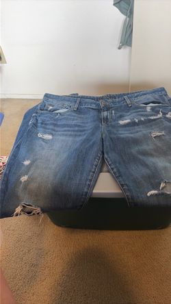 Distressed Blue Denim Jeans