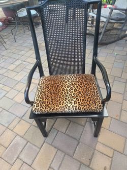 vintage black-lacquered cane-back armchair