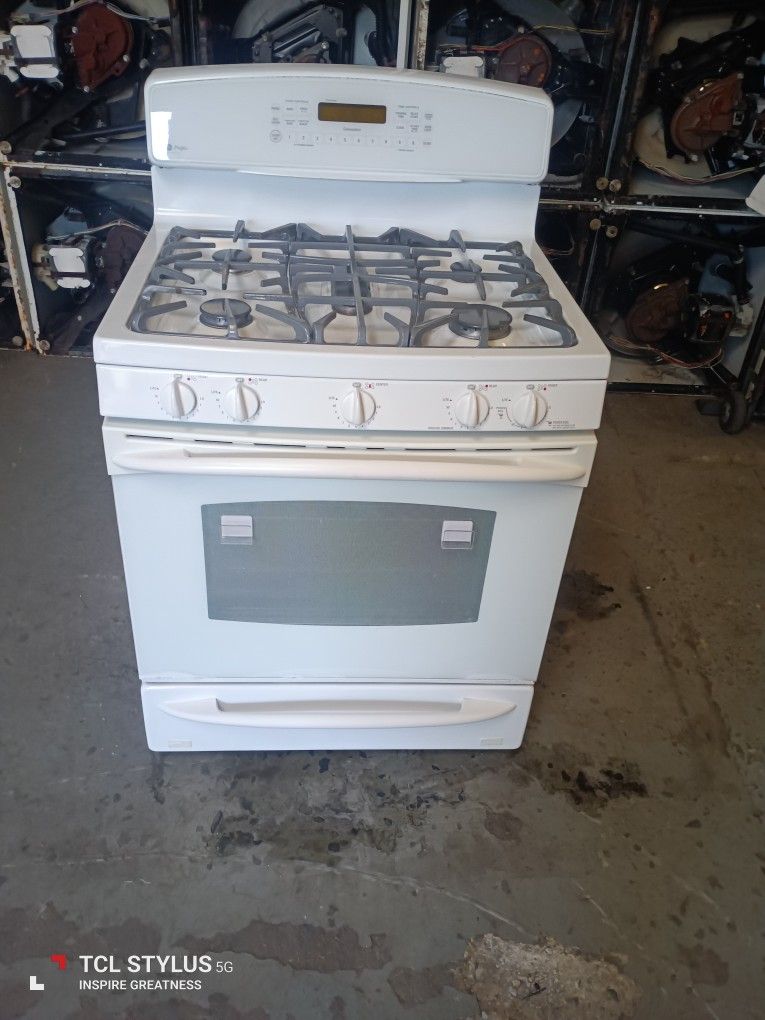 Stove Gas GE 5 Burners Everything Is And Good Working Condition 3 Months Warranty Delivery And Install
