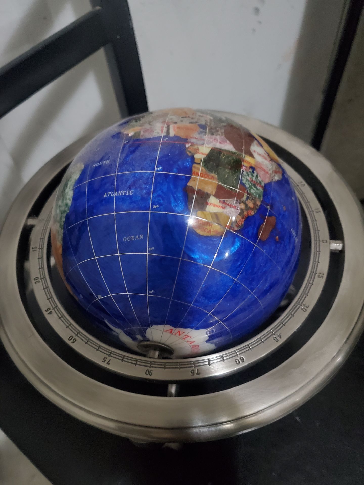 GEMSTONE GLOBE WITH BLUE LAPIS ON SILVER BASE WITH COMPASS. $100