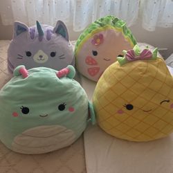 Four big Squishmallows