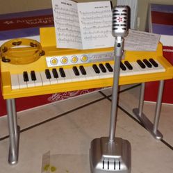 American girl Keyboard Piano,microphone And Tambourine Set $60.00