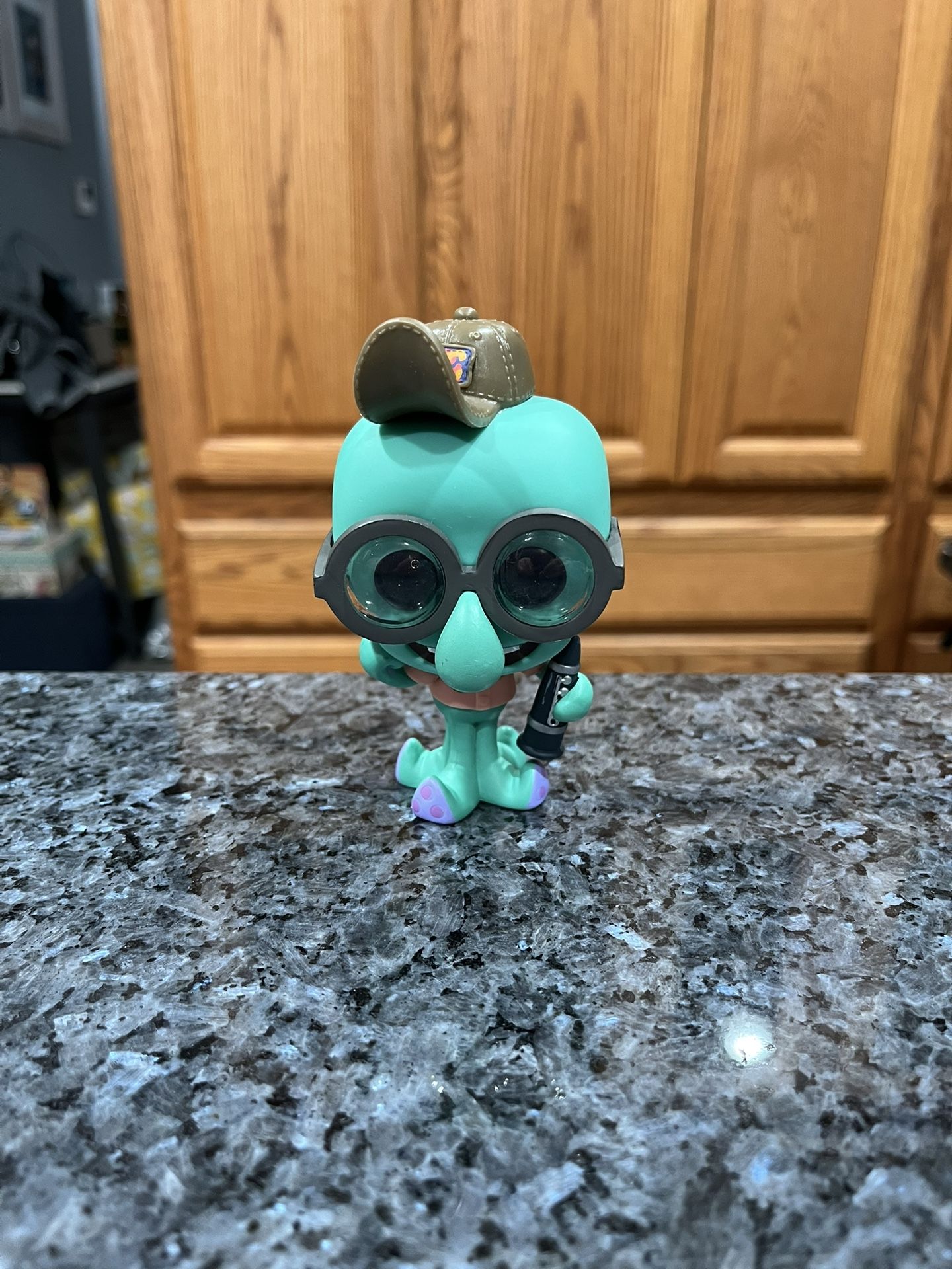 Funko Pop! Spongebob Squarepants Squidward Tentacles #918. Preowned no box. Has been on display in a cabinet with a Funko Pop collection. Smoke fre
