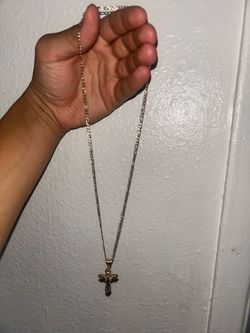 14k figaro style chain with pendant.