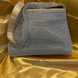 silver Beaded embellished evening shoulder bag with a zipper closure.$10