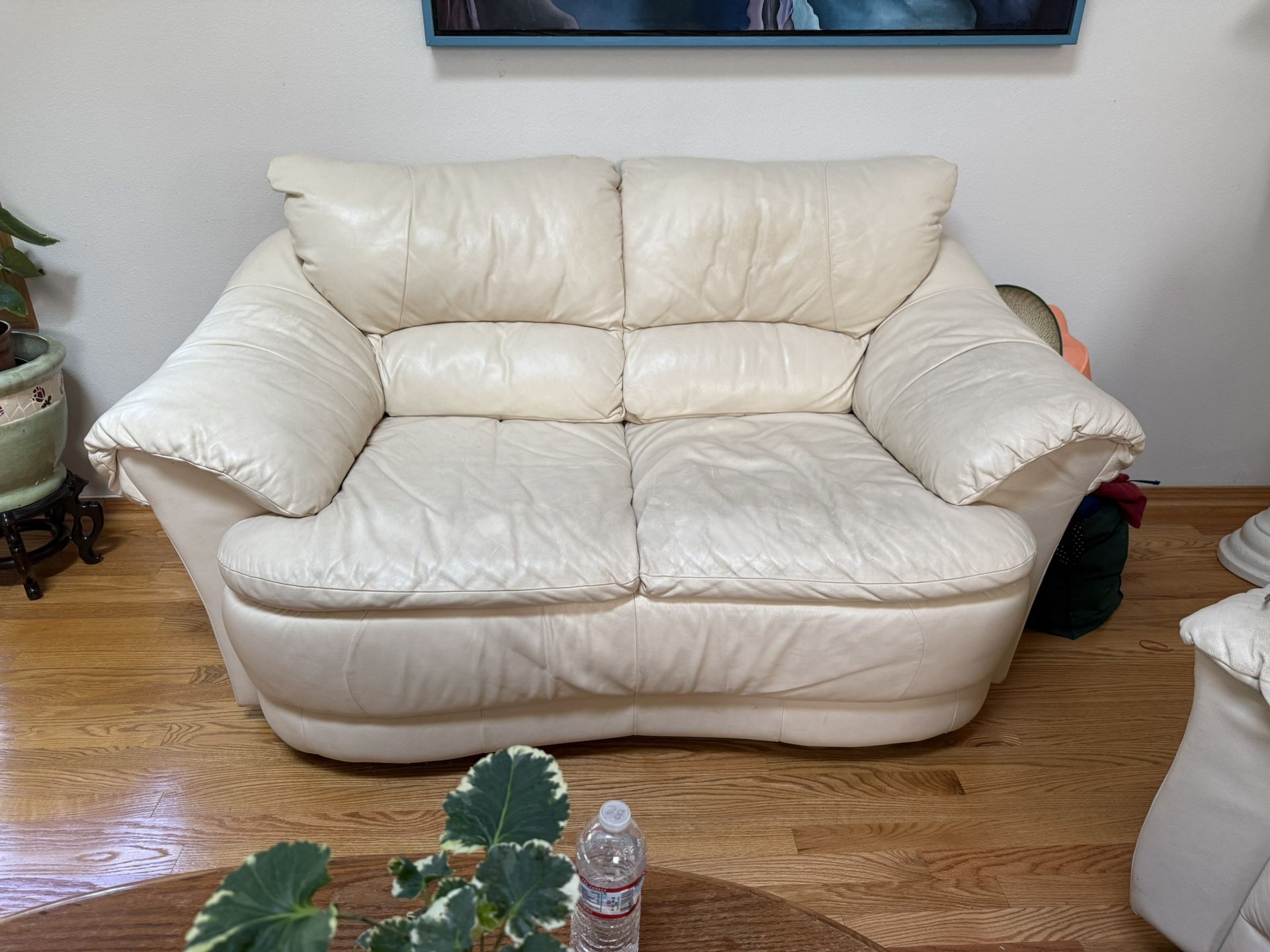Comfortable Cream Leather Loveseat
