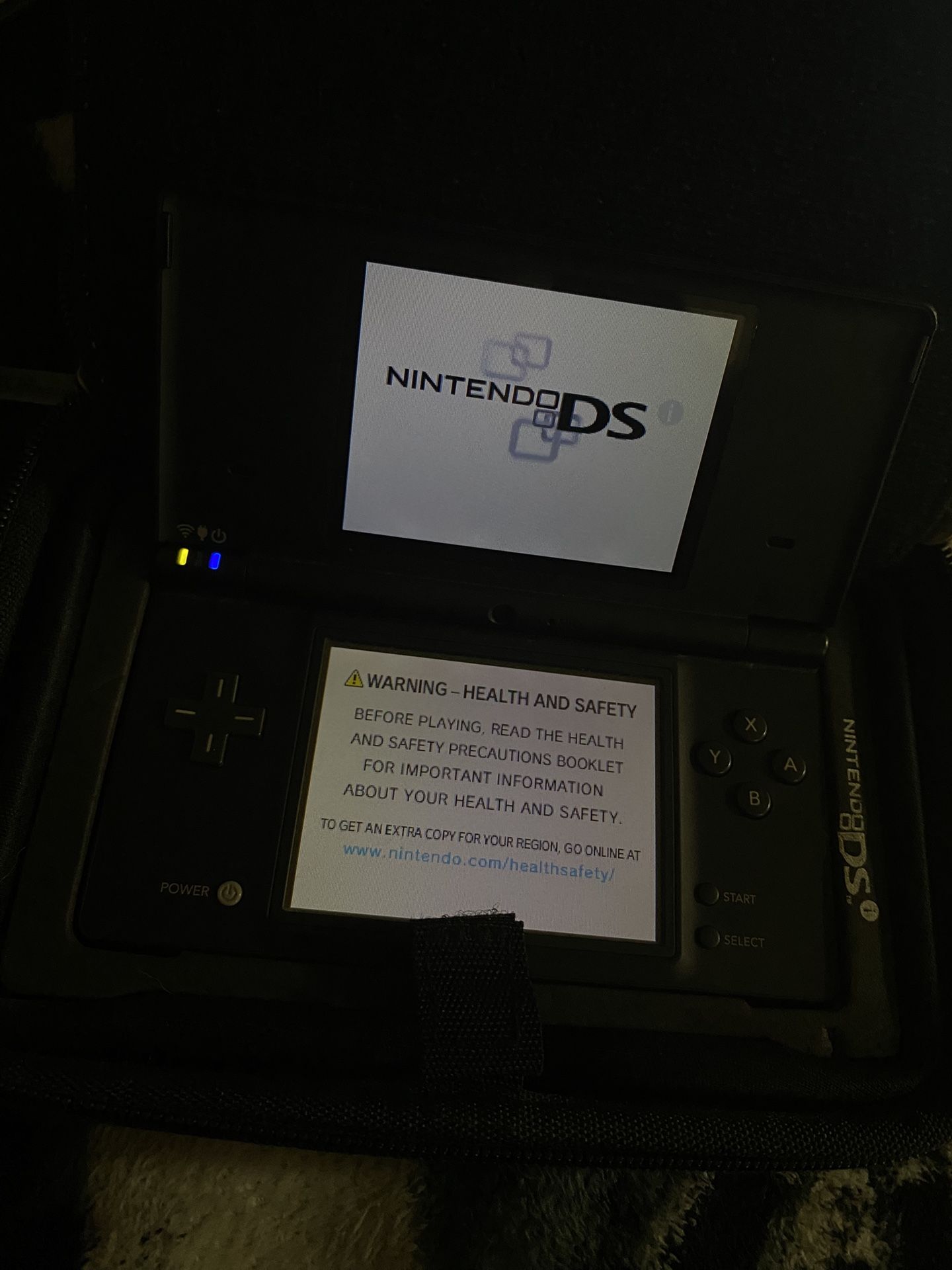nintendo dsi with games