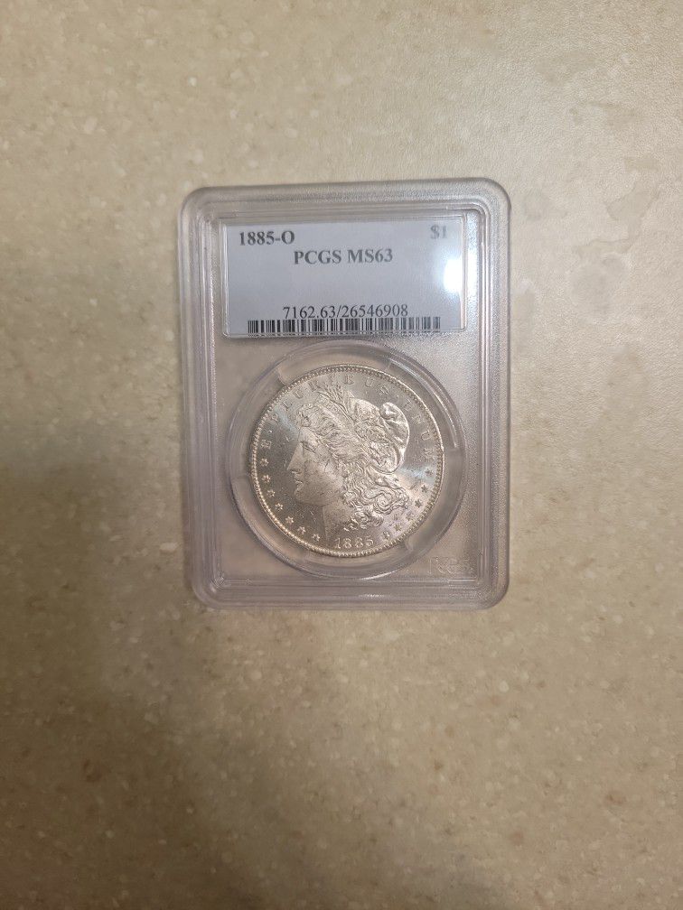1885 O Morgan Silver Dollar.  Graded 