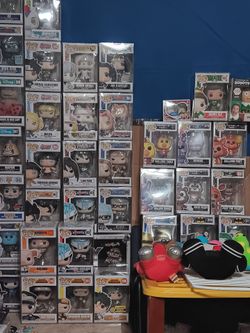 Hundreds of funko pops and collection of pokemon cards