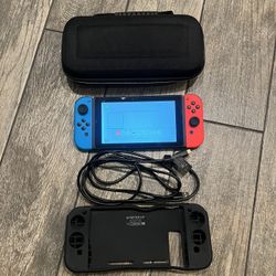 Nintendo Switch Console with Joy Cons and Carrying Case