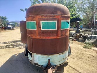 Horse trailer hauling goats chivos cows burros pink on hand