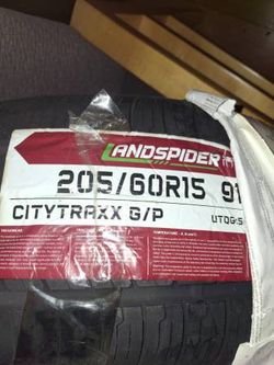 Two unused 205/50R15" tires