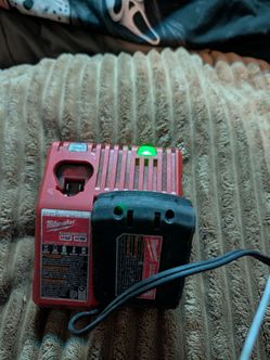 Milwaukee battery charger and battery