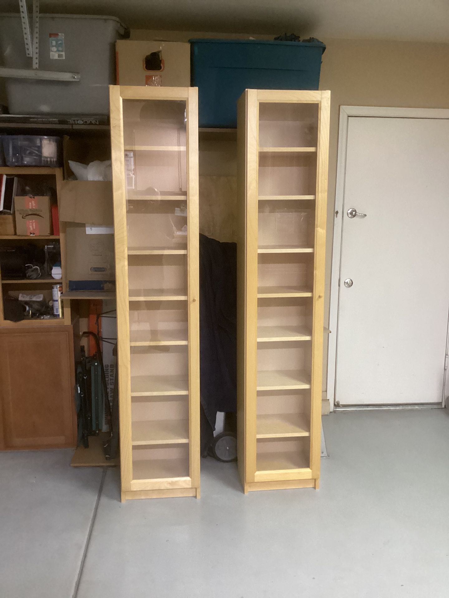 IKEA storage cabinet with a glass door 79 inches tall 16 inches wide and 10 inches deep    ($30 each)