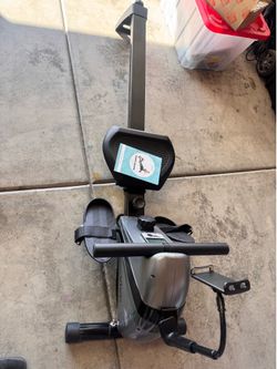Rowing exercise machine