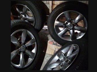 FOUR  Lexus suv 460 GX years 2013-2019 OEM rims good condition (18x7.5, alloy) & 4  GOODYEAR WRANGLER SRA TIRES  (P265/60R18 ) WITH GOOD TREAD , no va