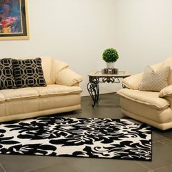 Ivory, Soft leather sofa, chair and end Table