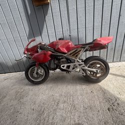 49cc Mini Motorcycle Bike Red It Does That Turn On The Engines Messed Up. The Brakes Are Messed Up, And The Chains Are Jammed.