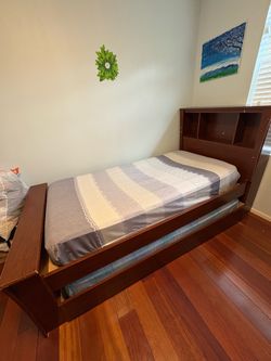 Free Trundle twin beds with book shelves head board and mattresses