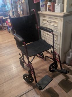 Red portable wheel chair