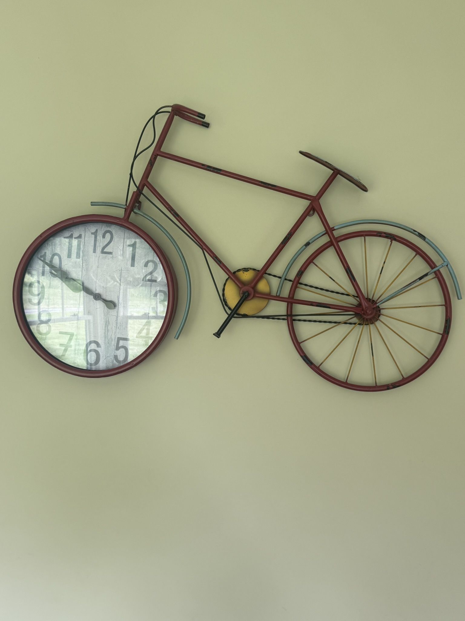 Fun bicycle wall clock for sale! Unique design with a clock in the front wheel. Great condition, perfect for adding character to any room.