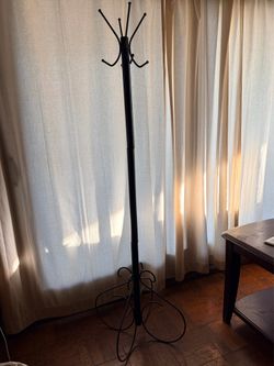 Black Coat and Hat Stand