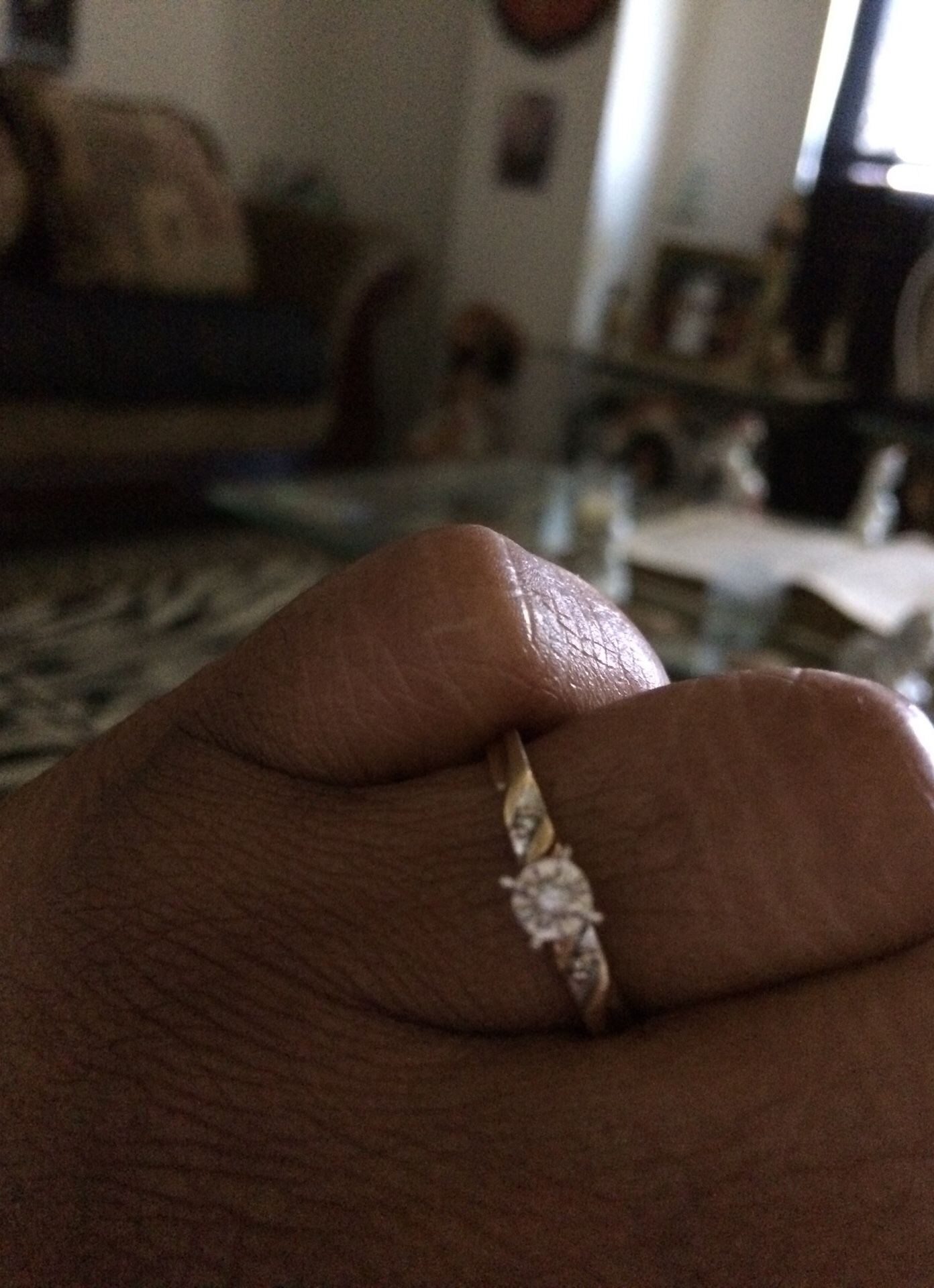 Lady ring size 7 in a half, 10 k diamond & gold