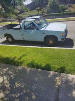 Ready to work 1985 GMC S 15 includes lumber rack and tool box with tools