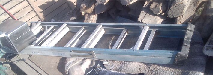 Fiberglass and aluminum 8 foot ladder