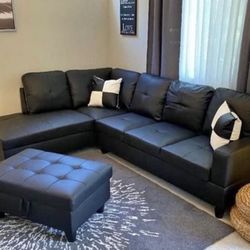Black Leather sectional Couch And Ottoman 