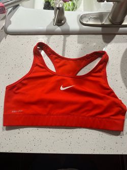 Red and blue Nike dri fit gym bras