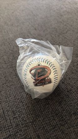 This is a 1998 Arizona Diamondbacks opening day souvenir baseball celebrating the team's inaugural Major League Baseball game.