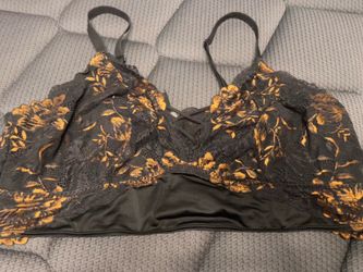 Black and gold lace bra