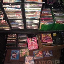 Over 250 karaoke Cdgs! Also miscellaneous karaoke equipment. All as is!
