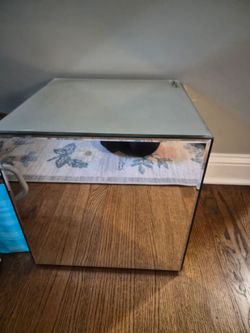 Howard Elliott mirror floor cube and floating shelf. Both new