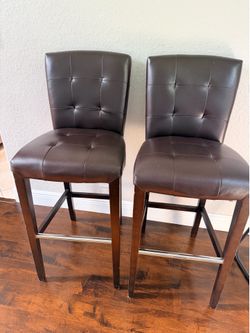 2 leather bar chairs
