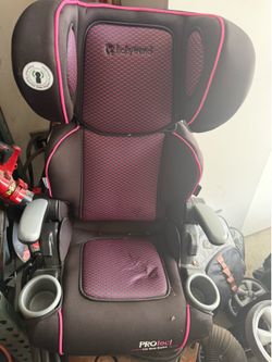Two pink car seats