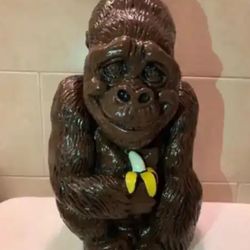 Friendly Gorilla Holding Banana Statue