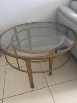 Glass top nesting coffee table