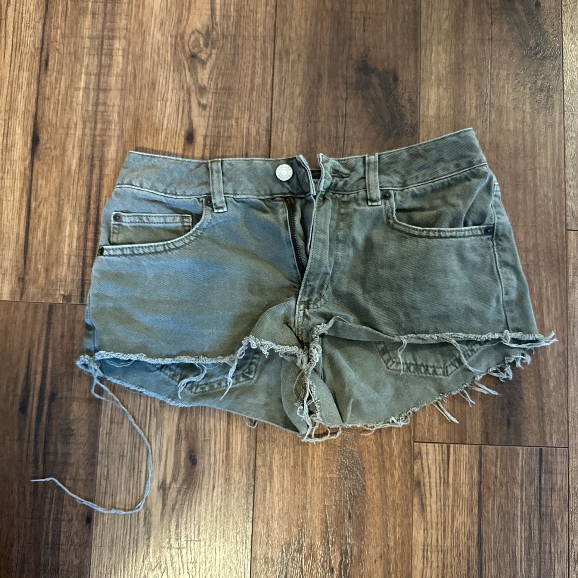 green garage denim shorts