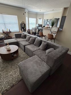 Brand new grey boneless couch
