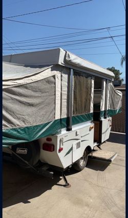 2010 Coleman pop up trailer