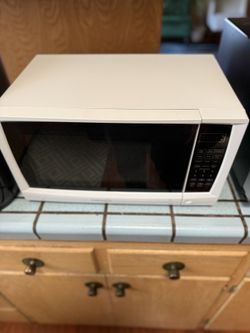 clean white mid size microwave