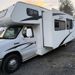 2009 freedom, express coachman 31ft with one super slide out. Class C motorhome. With only 60,000 original miles. 